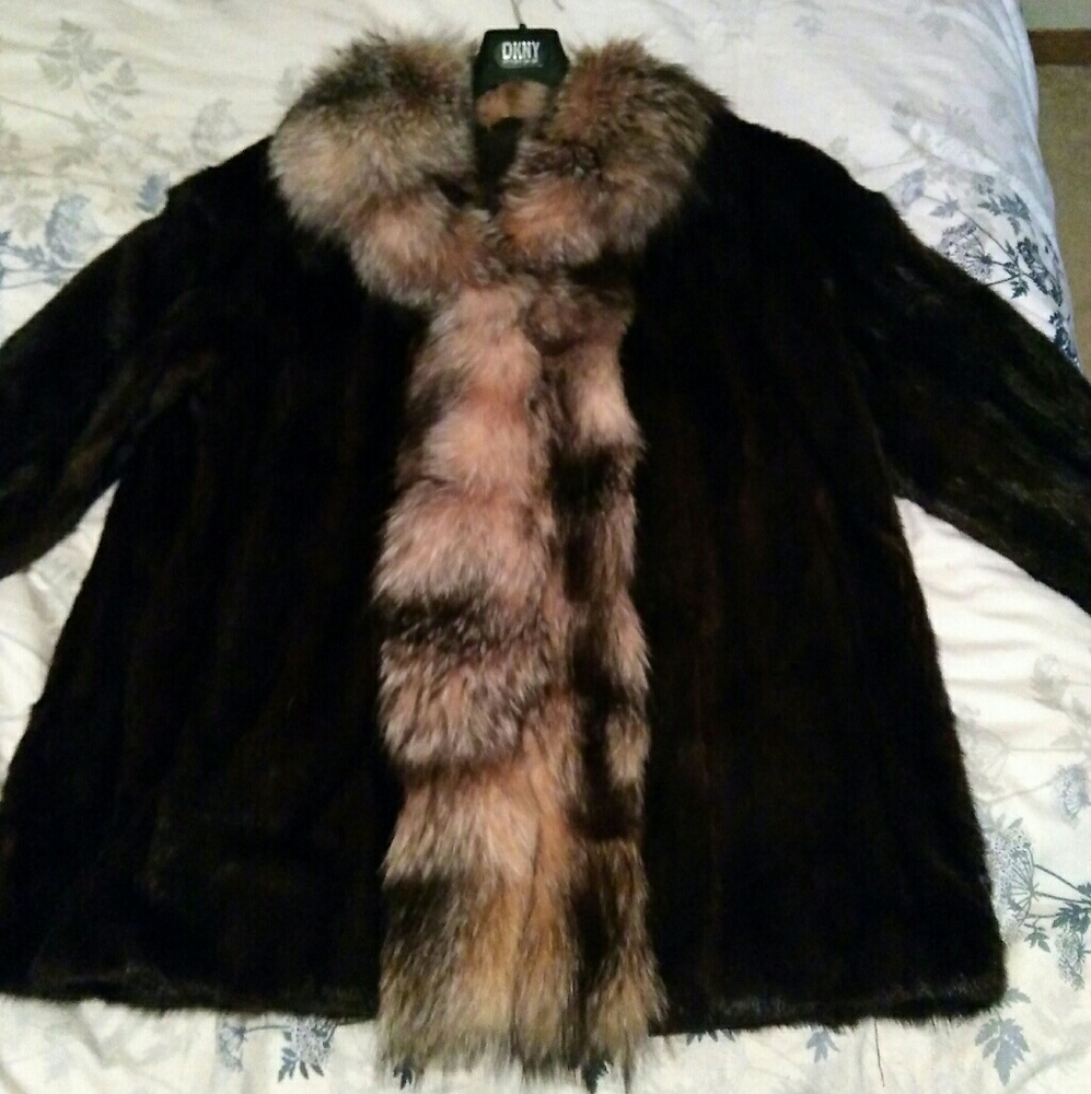 Mink coat with fox trim.
